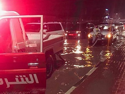 Ras Al Khaimah Police push cars out of valleys