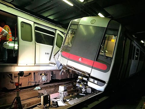 Two MTR trains sit after collision on the Tsuen Wan Line during testing of the rail company's new signal system in Hong Kong Monday, March, 18, 2019. Two Hong Kong subway trains collided in early hours on Monday, leaving one train driver suffered leg injury and the other felt unwell after inhaling smoke. It cause service suspensions between affected stations.