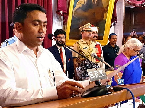 Goa Governor Mridula Sinha (R) administers the oath of the office to Pramod Sawant as the new Chief Minister of the state, at the Raj Bhavan in Panaji, Goa,Tuesday, March 19, 2019.