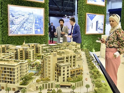 Higher real estate exposure is yet to show up in full on banks' balance sheets. Banks in the UAE are allowed to increase their exposure beyond 20 per cent of their total loan book. File picture from a property exhibition held in Dubai recently.