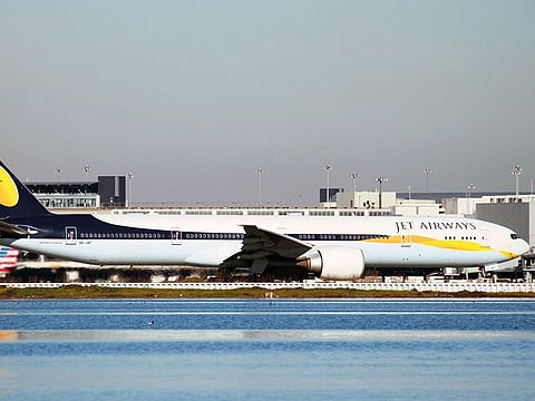 A Jet Airways plane  taxis at San Francisco Airport. Jet has racked up over $1 billion in debt, and owes money to banks, suppliers, pilots and lessors.