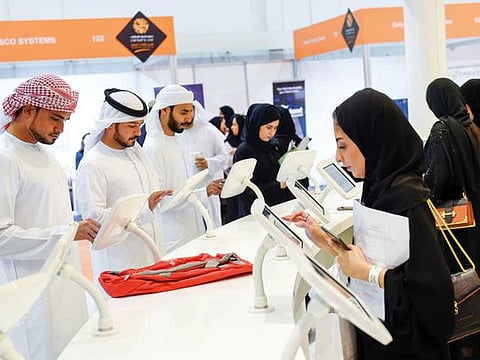 Emiratis at the Emirates stand. The group is seeking local talent to meet its requirements across various departments.