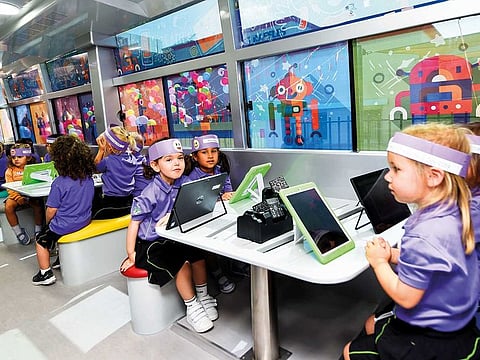 Students from Raffles Springs Nursery visiting the newly launched Bug Bytes Bus, a especially designed teaching van equipped with a spectrum of technology devices, educational software wherein students can enjoy a wide variety of ICT activities.