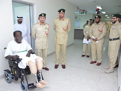Dubai police helped inmate with wheelchair.