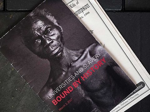 A 2017 program conference using as cover art an 1850 daguerreotype of the slave Renty, part of a Harvard professor’s study arguing that black people were an inferior race, Feb. 28, 2019.