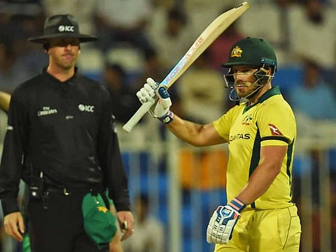 Aaron Finch of Australia celebrating after scoring fifty runs during the Pakistan vs Australia match in UAE 2019 ODI Series at Sharjah Cricket Stadium on 22 March, 2019  