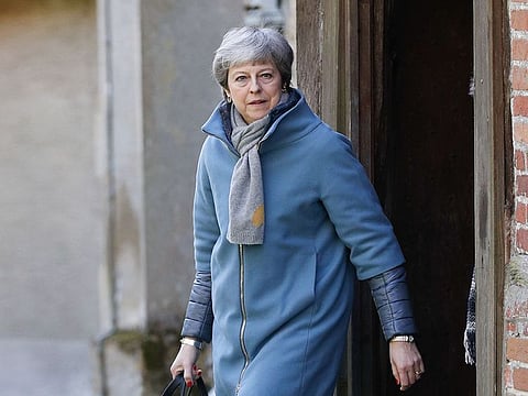 Britain's Prime Minister Theresa May leaves after attending a church service, near her Maidenhead constituency, west of London on March 24, 2019.
