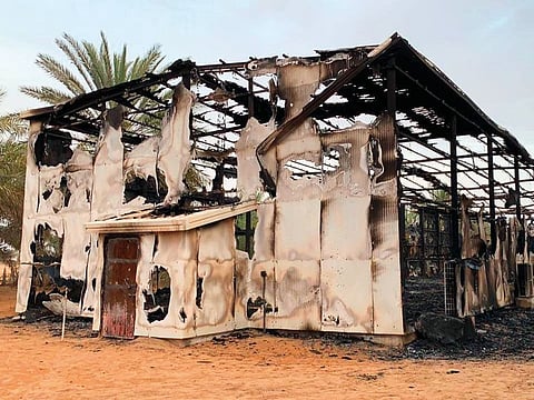 The charred remains of the barn after it  was struck by lightning when a freak storm hit Madinat Zayed