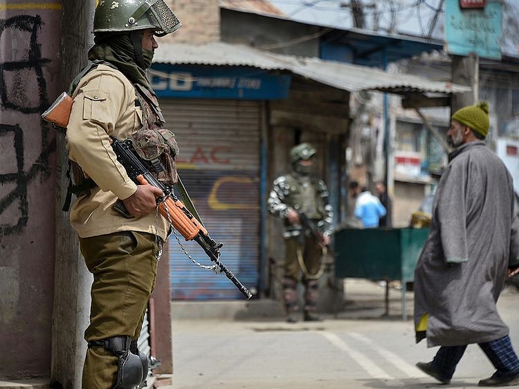 Security personnel stands guard