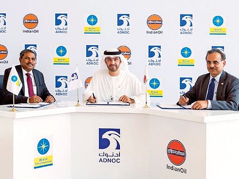 Sultan Ahmad Al Jaber with Bharat Petroleum and Indian Oil Corp executives during a signing ceremony.