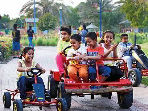 A family park in Abu Dhabi. In the next decade each house here will have a green space within a 200-metre radius.