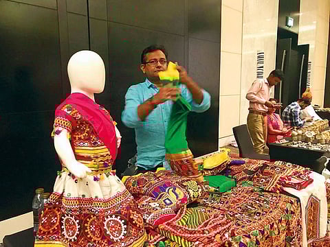 Indian artisans are displaying their items the workshop-cum-exhibition titled “Indian Handicraft Fair” organised by Embassy of India in association with Indian Business & Professional Group (IBPG), Abu Dhabi and Indian Pavilion at Global Village in Dubai on Monday in Abu Dhabi.