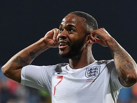 England's forward Raheem Sterling celebrates after scoring the fifth goal.
