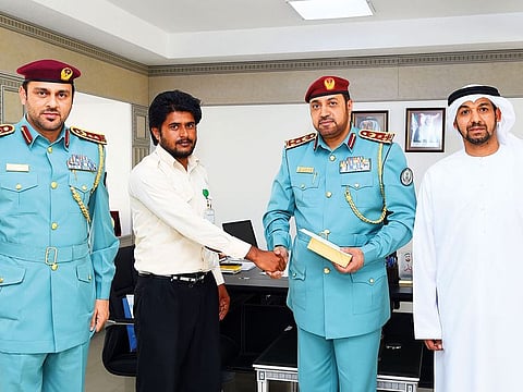 Brigadier Abdullah Mubarak Bin Amer, Deputy Commander-in-Chief of Sharjah Police, awarded Muzaffar Hussain Nather, a Pakistani expat, for his brave act of foiling a robbery.