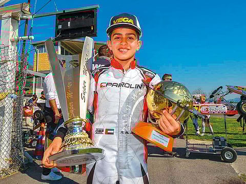UAE Karting Star Rashid Al Dhaheri poses with his trophies after winning the Championship for WSK Super Master Series.