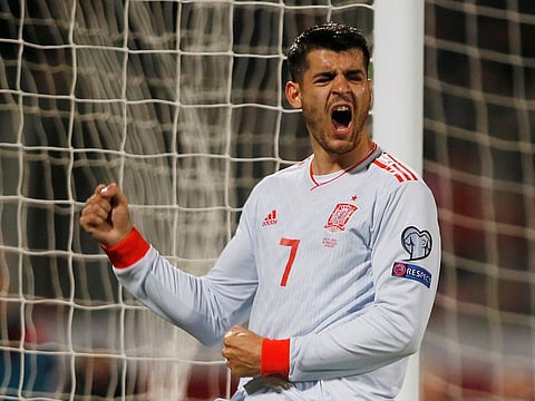 Spain's Alvaro Morata celebrates scoring their second goal.
