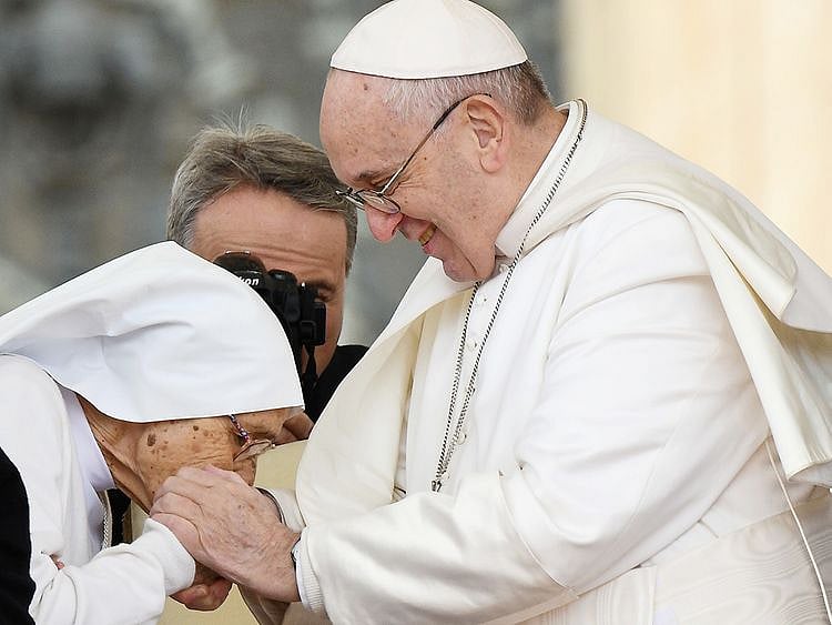 Pope Francis pays homage