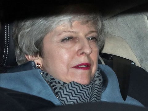 Britain's Prime Minister Theresa May leaves from the Houses of Parliament in Westminster, in central London on March 27, 2019, after hearing the outcome of the indicative votes on the alternative options for Brexit.