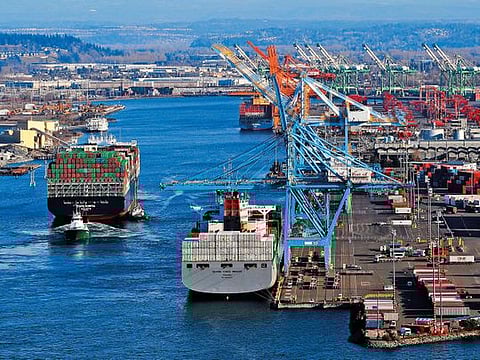 Globalisation and free flow of trade is in retreat, perhaps forever. Pictured here are container ships calling at the Port of Tacoma. 