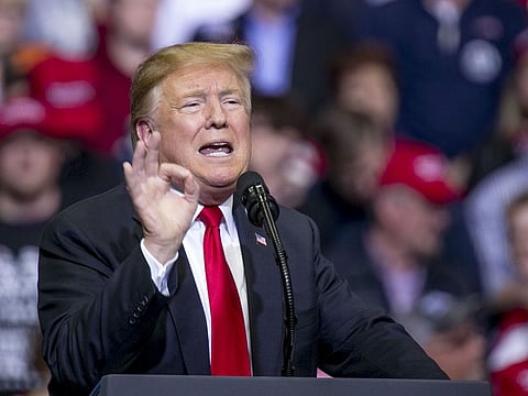 U.S. President Donald Trump gestures as he speaks during a rally in Grand Rapids, Michigan, U.S., on Thursday, March 28, 2019. 
