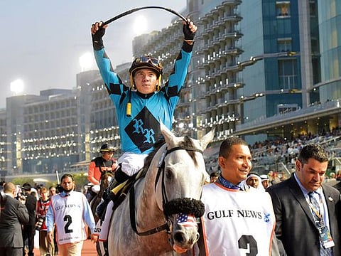Emisael Jaramillo celebrates after guiding XY Jet to win the Dubai Golden Shaheen. 