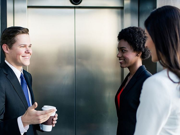 OPN-Three-people-in-a-lift-(Read-Only)