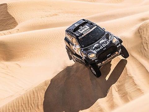 Stephane Peterhansel in his Mini John Cooper Works Rally during the second stage.