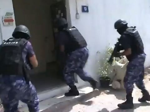 UAE Police arrested a 24-member gang who conned residents into transferring telephone recharge cards to claim their prize. 