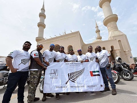 Abu Dhabi-based bikers, who will be flying tonight to New Zealand are seen in front of the Mary Mother of Jesus Mosque on Airport road, Abu Dhabi.