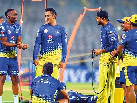 Skippers of Chennai Super Kings (CSK) MS Dhoni and teammates Dwayne Bravo and Harbhajan Singh during a practice session ahead of IPL 2019 at MAC Stadium in Chennai,