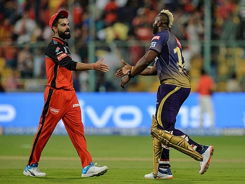 Royal Challengers Bangalore captain Virat Kohli and Kolkata Knight Riders batsman Andre Russell 