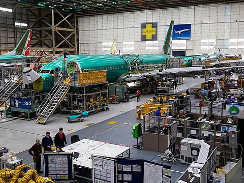 Boeing 737 MAX planes on the assembly line at the Boeing plant in Renton, Washington.  Boeing Co current and former company directors have reached a $237.5 million proposed settlement with shareholders to settle a lawsuit over the safety oversight of the 737 MAX. 