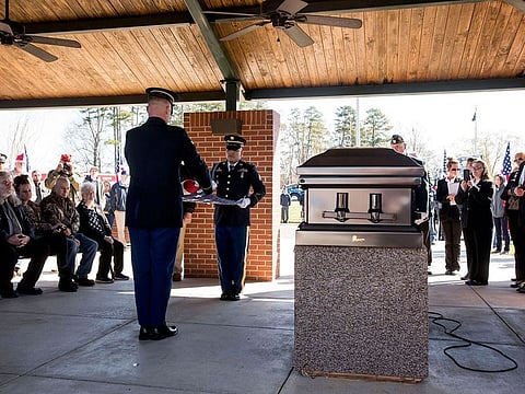 US Army honor guard folding the American flag that covered the casket during the burial ceremony at the Salisbury National Cemetery US Army medic Phillip Kenneth Drye, a veteran of the Vietnam War, was buried at the Salisbury National Cemetery in Salisbury.