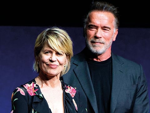 Actors Linda Hamilton (L) and Arnold Schwarzenegger