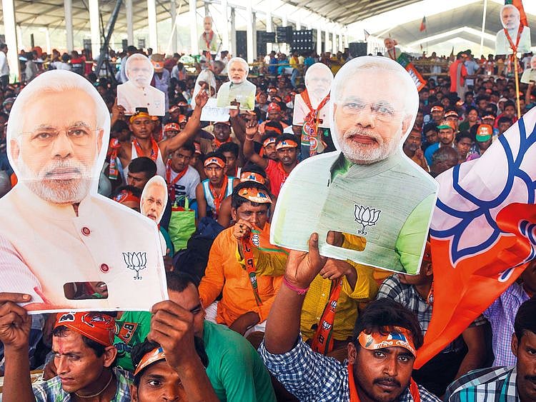 Supporters of the Bharatiya Janata Party (BJP) cheer