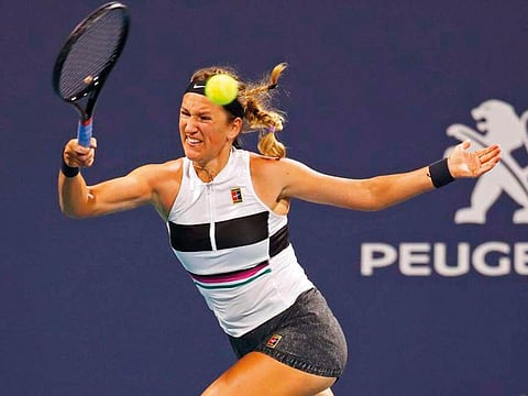 Victoria Azarenka of Belarus hits a forehand against Caroline Garcia of France (not pictured) in the second round of the Miami Open at Miami Open Tennis Complex. 