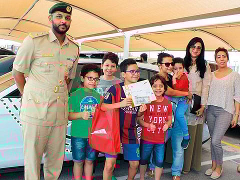 Mariana Yousuf (third from right) with her children and friends. Yousuf has been driving for over 11 years in the UAE.