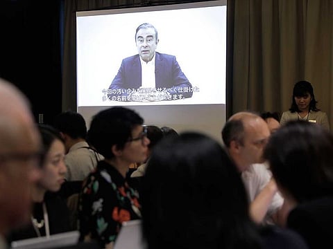 A video of Carlos Ghosn, former chairman of Nissan Motor Co., is projected on a screen during a news conference at the Foreign Correspondents' Club of Japan (FCCJ) in Tokyo, Japan, on Tuesday, April 9, 2019. 