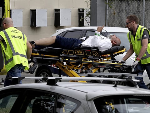 File photo: Ambulance staff take a man from outside a mosque in central Christchurch, New Zealand, Friday, March 15, 2019. 