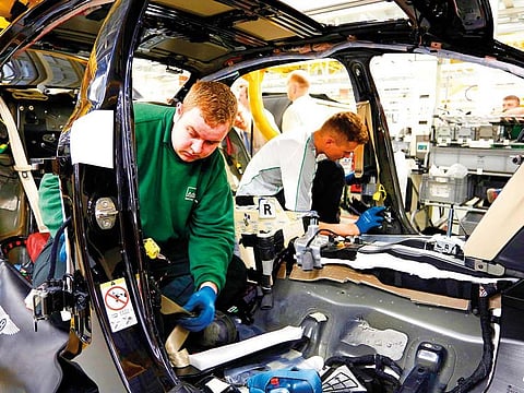 A Bentley production line in Crewe. A pick-up in the British economy in February was broad-based, with manufacturing rising 0.9 per cent and construction gaining 0.4 per cent.