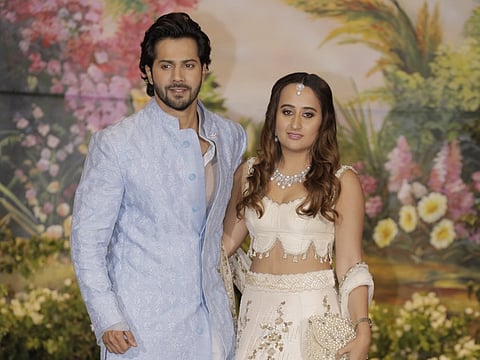 Actor Varun Dhawan and fashion designer Natasha Dalal at the wedding reception of actress Sonam Kapoor and businessman Anand Ahuja in Mumbai on May 8, 2018.