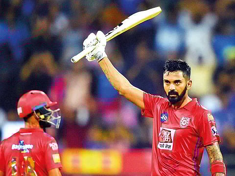 Kings XI Punjab player KL Rahul celebrates his century during the Indian Premier League 2019 cricket match between Mumbai Indians (MI) and Kings XI Punjab (KXIP) at Wankhede Stadium in Mumbai.