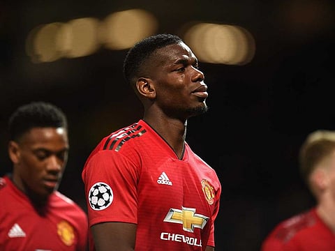 Manchester United’s French midfielder Paul Pogba reacts after losing the UEFA Champions league first leg quarter-final football match between Manchester United and Barcelona at Old Trafford in Manchester, north west England.