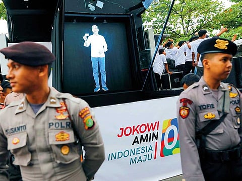 Hologram of Indonesia's presidential candidate Joko Widodo is seen at a carnival during a campaign rally in Tangerang, Banten province, Indonesia.