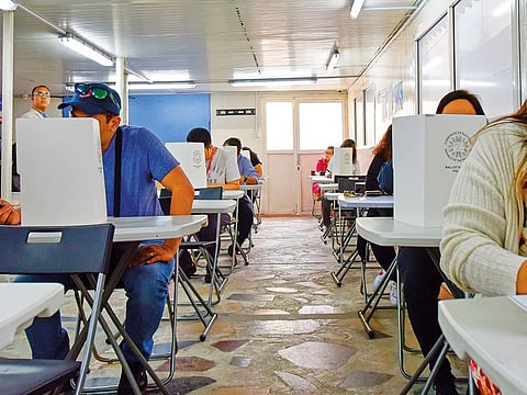 Filipino expatriates in the UAE cast their vote on the first day of overseas elections.