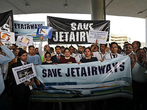 Employees of Jet Airways during a protest outside Indira Gandhi International Airport in New Delhi.
