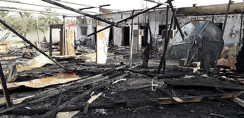 The line of houses razed by the blaze in Al Ain that killed six Pakistani truck drivers.
