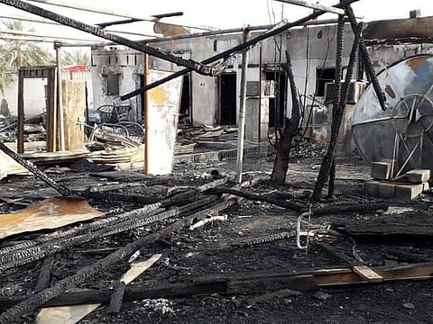 The line of houses razed by the blaze in Al Ain that killed six Pakistani truck drivers.