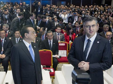 Croatia's Prime Minister Andrej Plenkovic, right, and his Chinese counterpart Li Keqiang attend the beginning of the Summit of Central and Eastern Europe and China in Dubrovnik, Croatia, Friday, April 12, 2019.