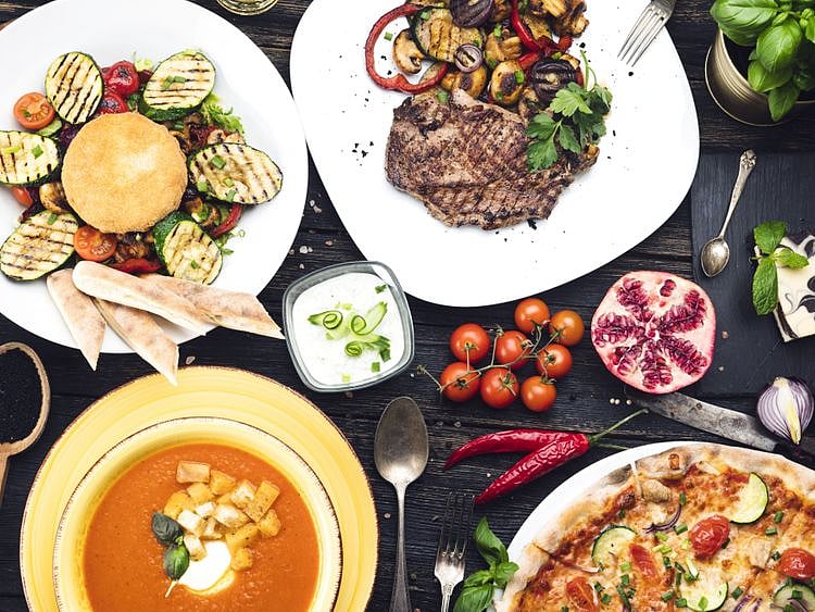 OPN-A-dinner-table,-full-of-food-1555245022435